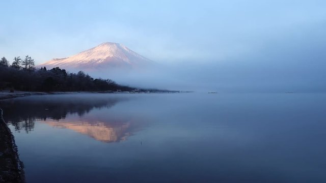 Mt. Fuji over a Foggy Lake in a Morning
