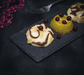 panna cotta on a black background