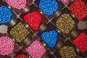 Polymeric dye. Colorant for plastics. Pigment in the granules.
