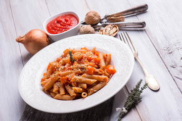 pasta with pumpkin tomato sauce nuts and sesame seeds