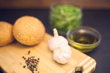 cooking ingredients on a black stone background