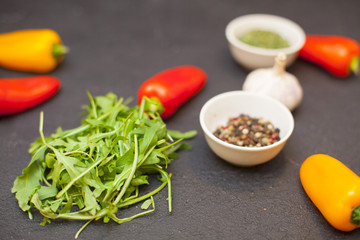 cooking ingredients on a black stone background