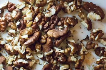 walnut kernels on a white plate