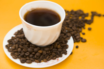 Coffee on yellow background