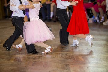 Partners legs in ballroom dance