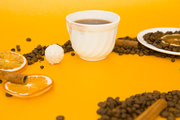 Obraz na płótnie Canvas Coffee on yellow background