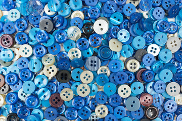 Fototapeta premium Set of small blue sewing buttons as background
