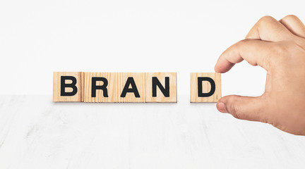 hand building brand on white