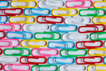 close up of arranged colorful paper clip