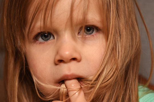 Offended little child is upset and crying