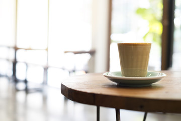 hot coffee in the morning on wooden table 