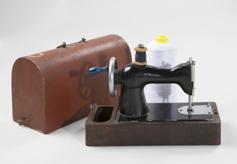 old sewing machine with case
