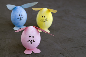 Easter colored eggs on the grey background.