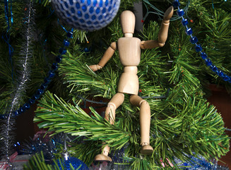 a puppet with a Christmas tree