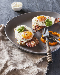 Appetizer with prosciutto and fried egg
