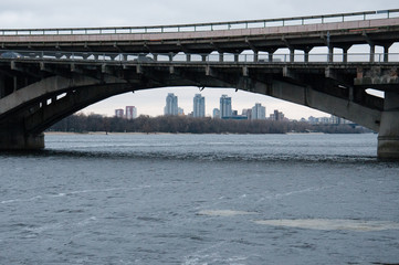 Bridge metro across the Dnieper River in Kiev. The concept of loneliness and sadness.