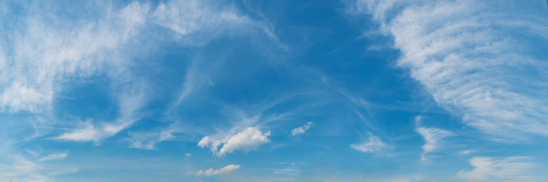 Vibrant color panoramic sky with cloud on a sunny day. Beautiful cirrus cloud. Panorama  photograph.