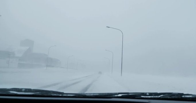 Reykjavik city Iceland pov driving zero visibility whiteout winter blizzard.mov