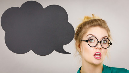 Confident rude business woman with thinking bubble