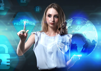 The concept of business, technology, the Internet and the network. A young entrepreneur working on a virtual screen of the future and sees the inscription: Data protection