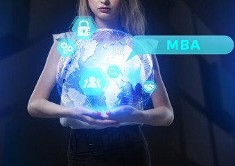 The concept of business, technology, the Internet and the network. A young entrepreneur working on a virtual screen of the future and sees the inscription: MBA
