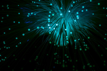 Fototapeta na wymiar shiny blue fiber optics background