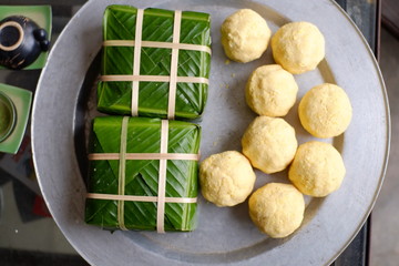 Packing Banh Chung (sticky rice cake), this is a traditional Vietnamese rice cake which is made from glutinous rice, mung beans, pork and other ingredients.