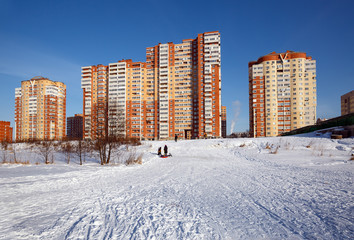 New residential neighborhood on the bank of the river Pekhorka in winter. City of Balashikha, Moscow region, Russia.