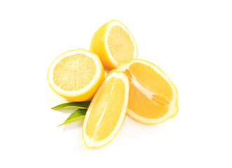 Composition of delicious citrus yellow fruit lemons and green leaves on white background