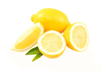 Composition of delicious citrus yellow fruit lemons and green leaves on white background