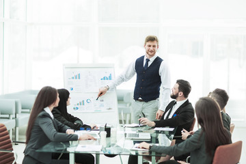  business team gives a presentation of a new financial project for the business partners of the company