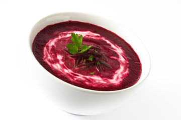 Beet soup in white bowl isolated on white background

