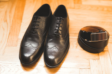 Men's accessories with luxury shoes. Top view
