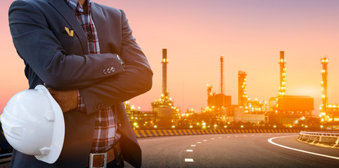Engineers and oil refineries and evening lighting.