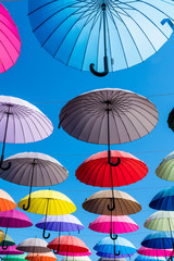 Colorful umbrellas background. The sky of colorful umbrellas