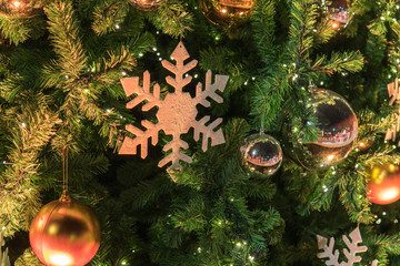 Snowflake decorate in Christmas tree.