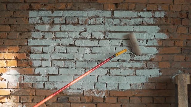 the red-brick walls, shaded white roller to paint. place for logo