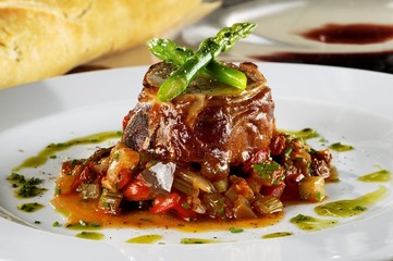 Rabbit stuffed with pistachio, asparagus and veal accompanied by ratatouille.