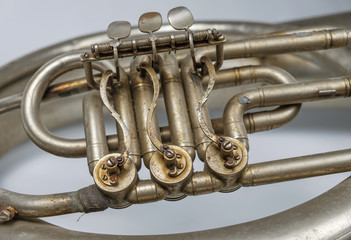 Detail of old vintage rusty french horn