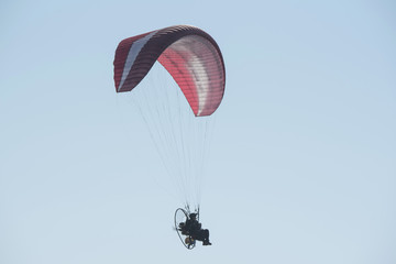A paraglider in the sky