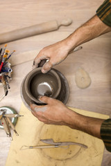 Fototapeta na wymiar Top view at making pottery