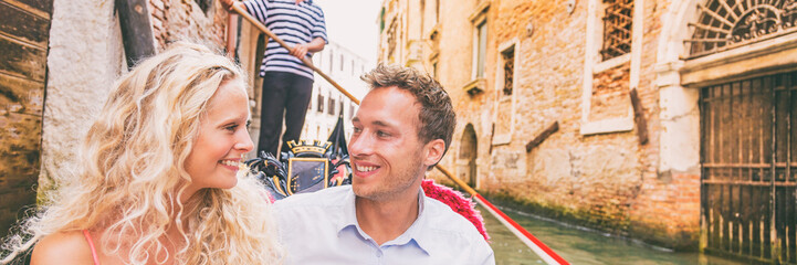 Italy vacation gondola in Venice honeymoon couple on romantic cruise panorama banner. Smiling blond...