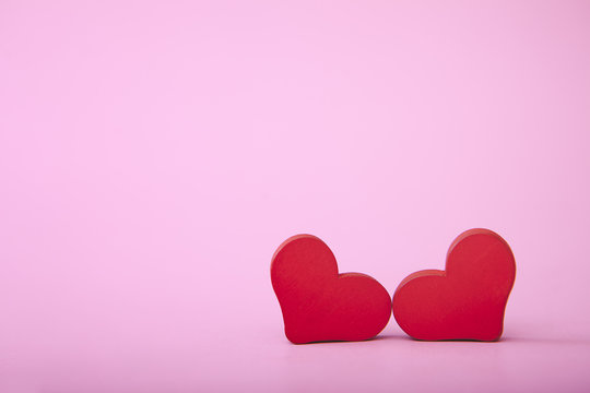 Love Hearts on pink Background with Copy Space