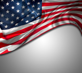 Fototapeta premium Rippled American flag on grey