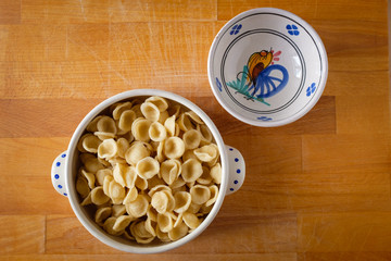 Typical Apulia region fresh pasta called orecchietta made of durum wheat semolina