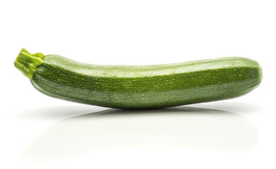 One green zucchini isolated on white background long raw courgette.