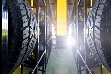 Tire rubber products , Group of new tires for sale at a tire store.