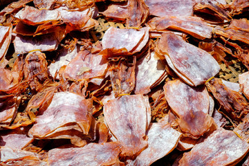 Raw squid dried, One of the seafood is souvenir of Ban Phe Fresh Market on Rayong province, Thailand
