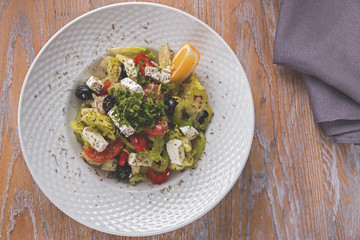 salad with fresh vegetables feta cheese goat tomato pepper salad olives