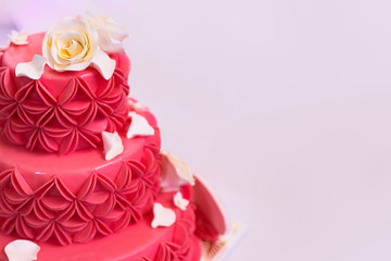 Colorful-large-red-cake-with-white-roses